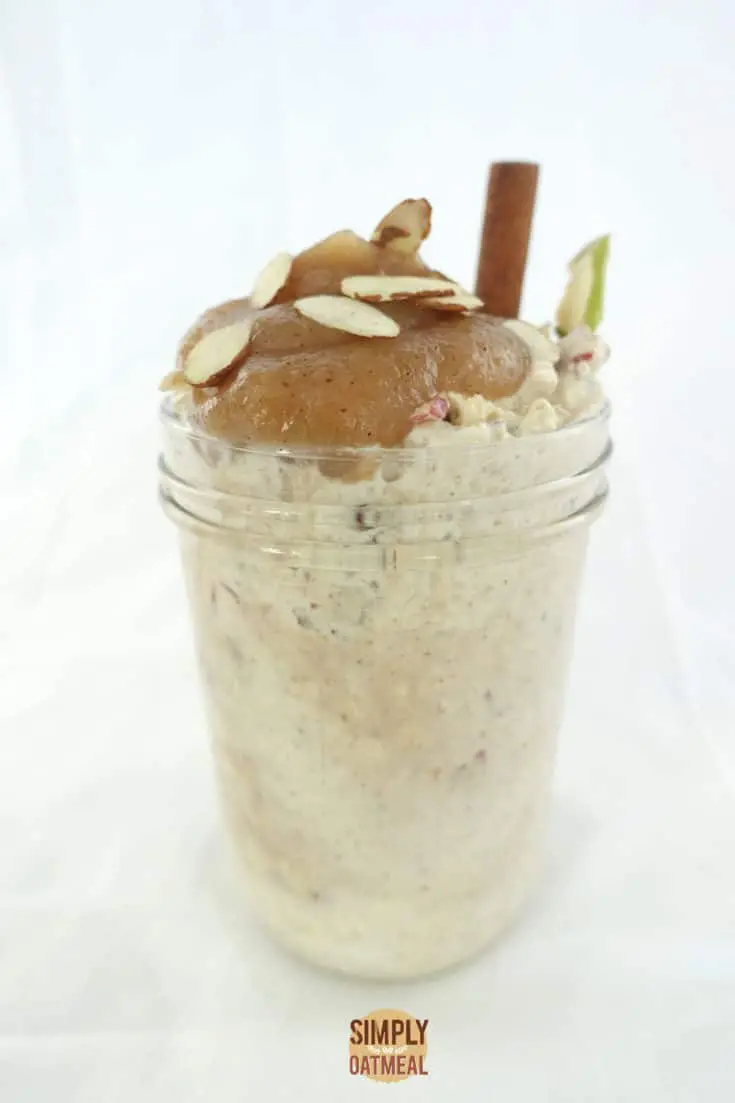 One serving of applesauce overnight oats in a mason jar.