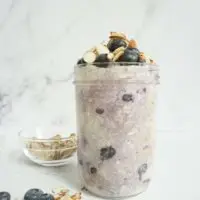 The blueberry almond overnight oats looks slightly purple because of the oats changed color from the berries..