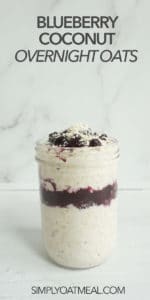 Overnight oatmeal layered with blueberry jam and topped with shredded coconut