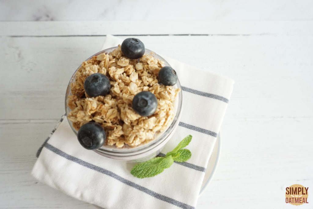 Blueberry pie overnight oats with a crunchy pie topping and fresh blueberries