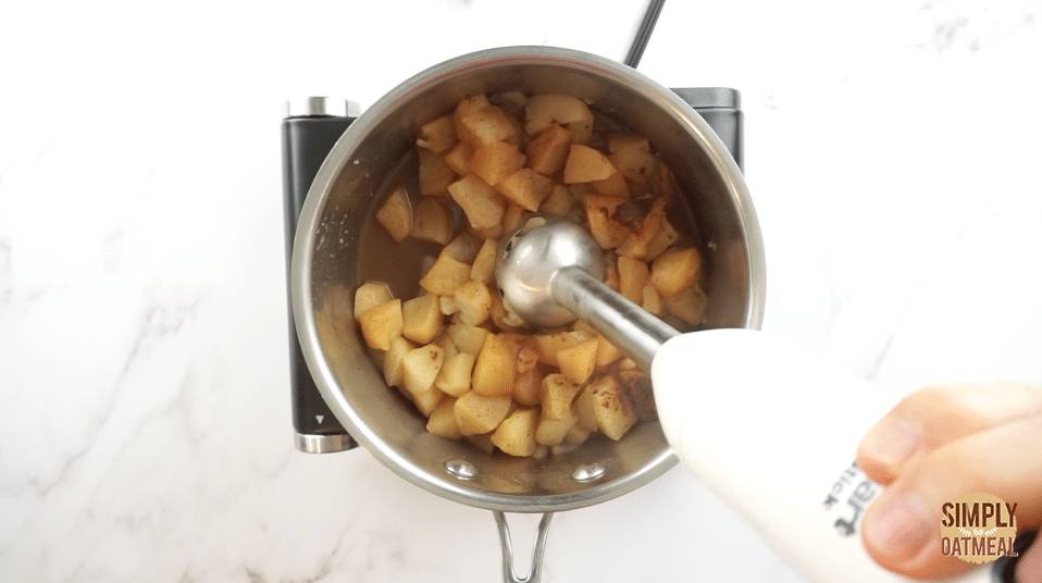 use an immersion blender to puree cooked apples in saucepan