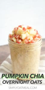 One serving of pumpkin chia overnight oats topped diced apple and pomegranate seeds