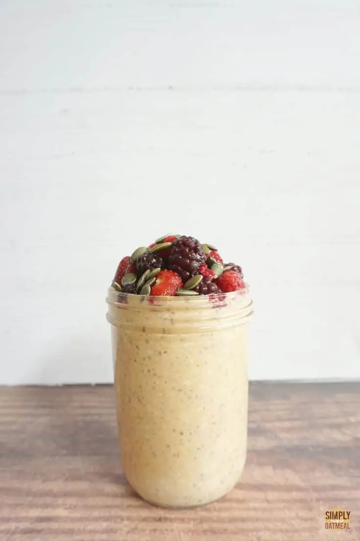 pumpkin seed overnight oats in a tall glass jar