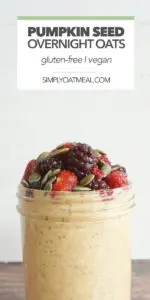 pumpkin seed overnight oats topped with roasted pumpkin seeds and mixed berries