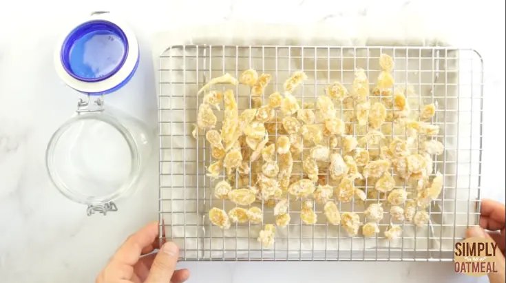 Transfer the candied ginger to an airtight container to preserve freshness.