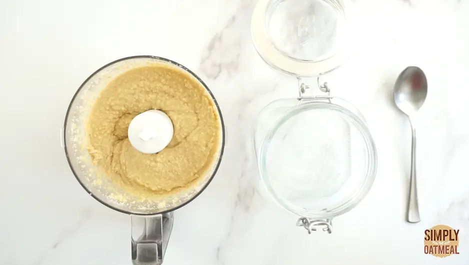 move homemade peanut butter from food processor to airtight container.