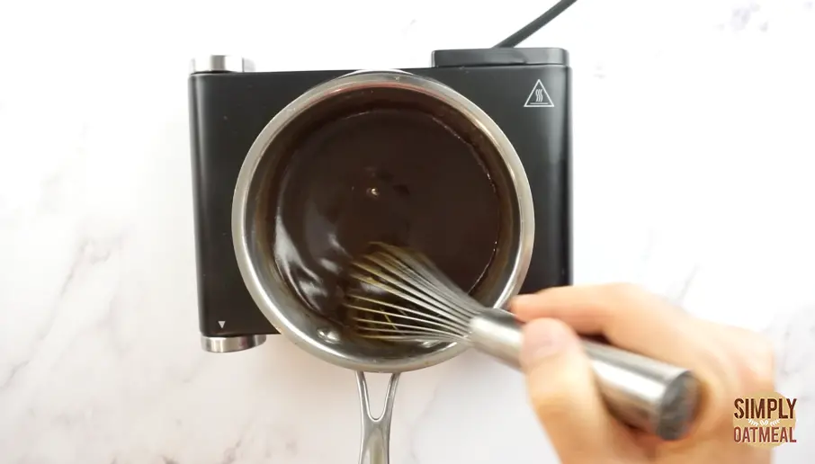 whisk cold butter into hot caramel sauce
