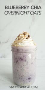 Tall glass container filled with one serving of blueberry chia overnight oatmeal.