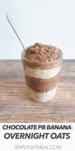 Chocolate peanut butter banana overnight oats in a glass jar with a spoon wedged inside.
