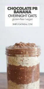 A glass bowl filled with layers of chocolate peanut butter banana overnight oats.
