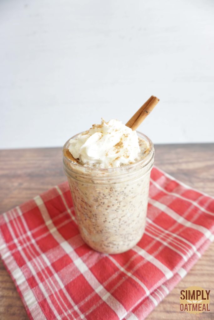 Cinnamon banana overnight oats served in a glass container.