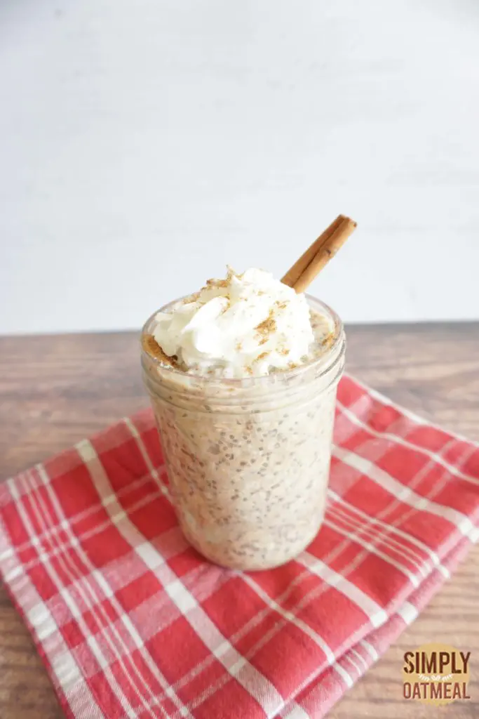 Cinnamon banana overnight oats served in a glass container.