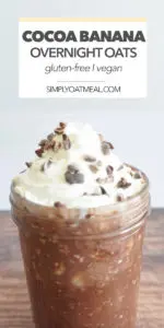 Cocoa banana overnight oats garnished with fresh whipped cream and shaved chocolate