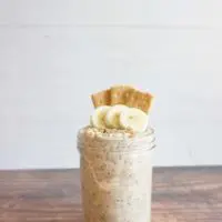 Single serving of mashed banana overnight oats in a mason jar.
