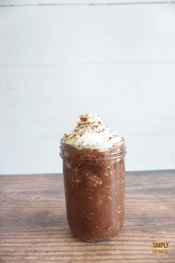 Single serving of mocha banana overnight oats in a mason jar.