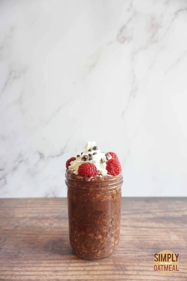 Single serving of raspberry chocolate overnight oats in a mason jar