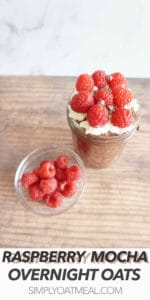 One serving of raspberry mocha overnight oats with fresh raspberries and whipped cream on top