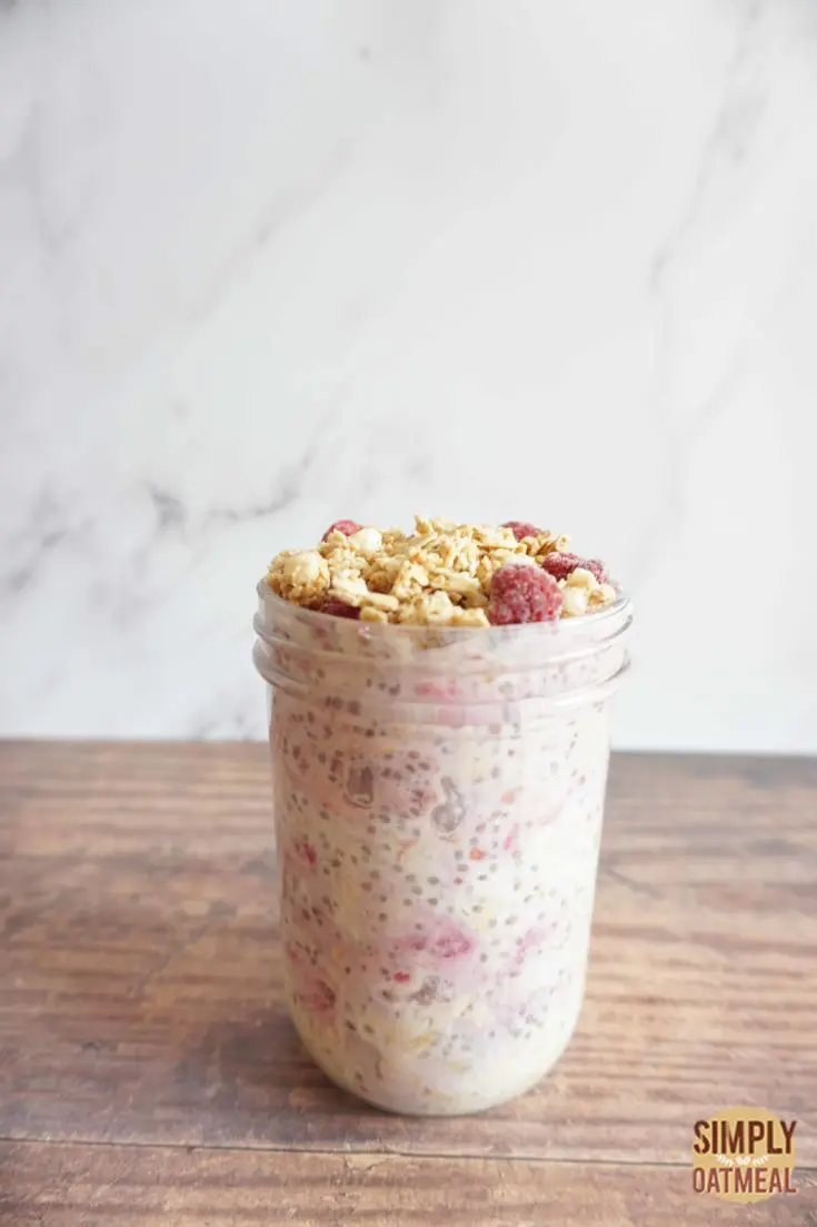 Single serving of raspberry vanilla overnight oats in a mason jar.