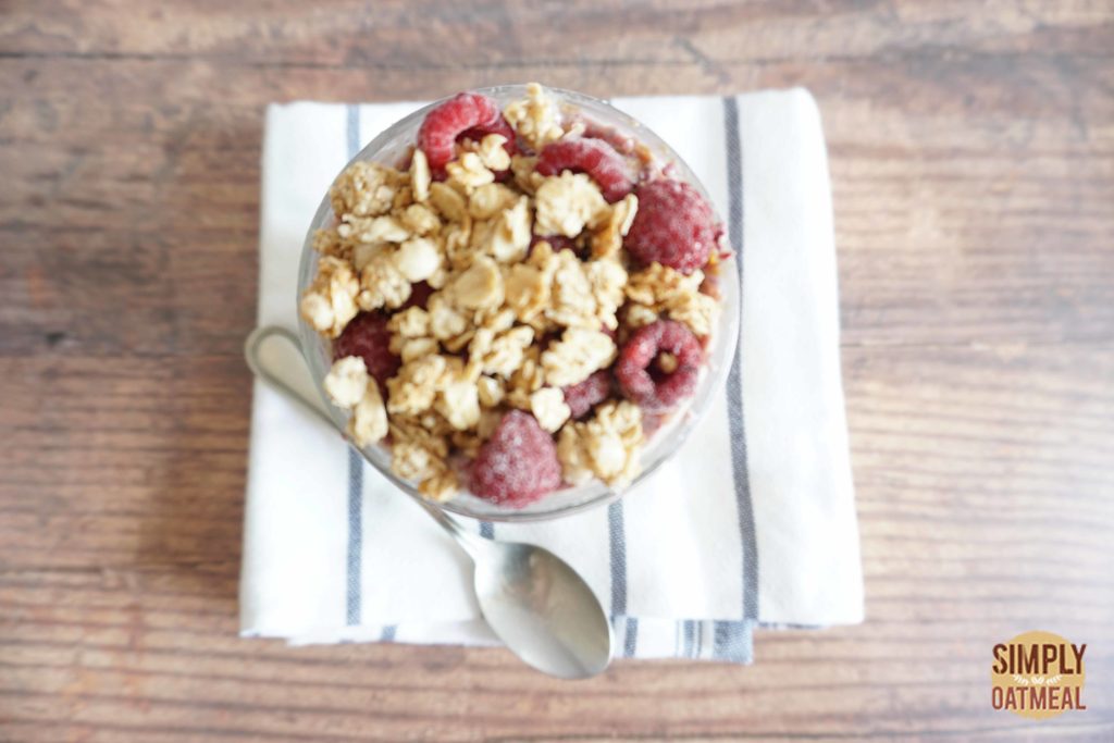 Raspberry vanilla overnight oats topped with oven baked granola, raspberries and scraped vanilla bean.