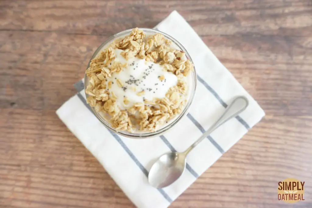 Bowl of raspberry yogurt overnight oats topped with greek yogurt, granola and poppy seeds Bowl of raspberry yogurt overnight oats topped with a spoonful of greek yogurt, oven baked granola and sprinkled with poppy seeds.