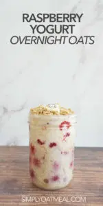 Single serving of raspberry yogurt overnight oats in a mason jar.