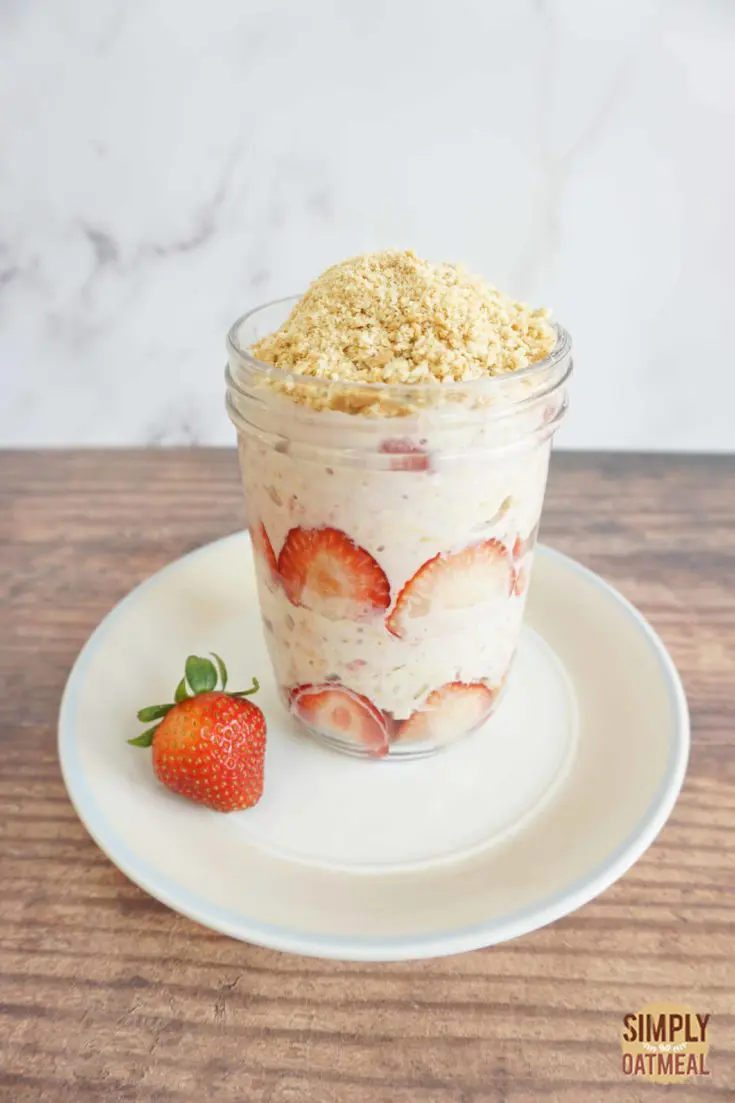 One serving of strawberry shortcake overnight oats in a glass jar