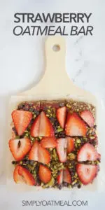 No bake strawberry oatmeal bars garnished with sliced strawberries