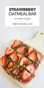 No bake strawberry oatmeal bar are cut into square bars to easily serve.