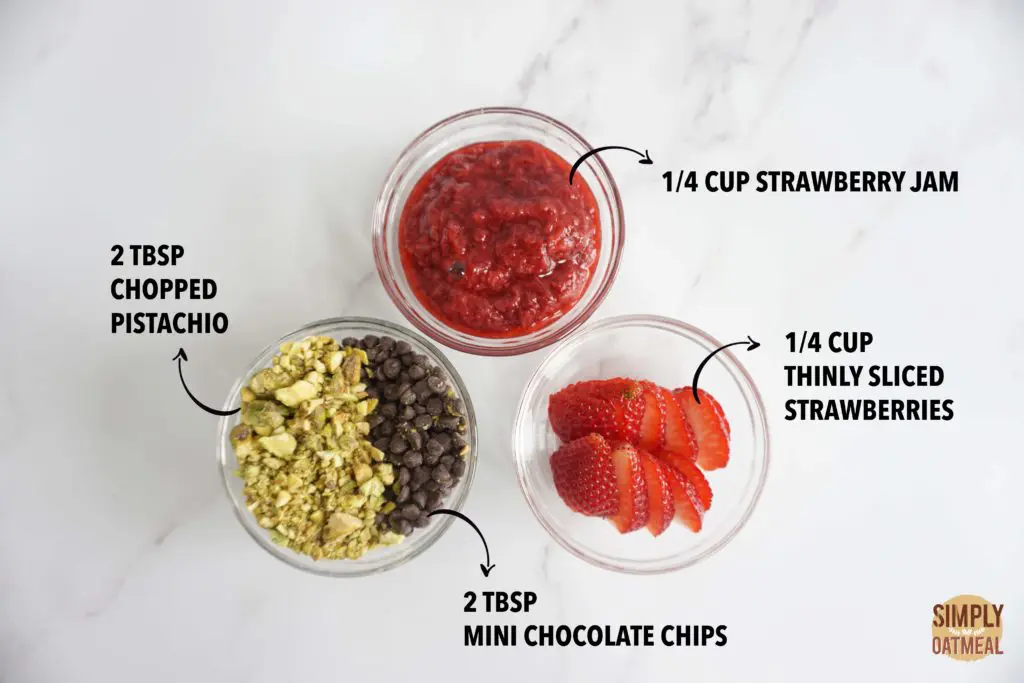 Pistachio, mini chocolate chip and strawberry toppings for the no bake strawberry oatmeal bars