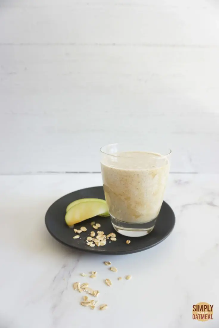 Single serving of caramel apple oatmeal smoothie in a glass cup