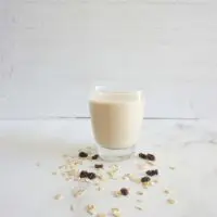 Single serving of oatmeal raisin cookie smoothie in a glass cup
