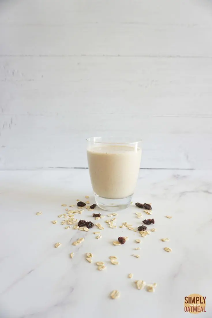 Single serving of oatmeal raisin cookie smoothie in a glass cup