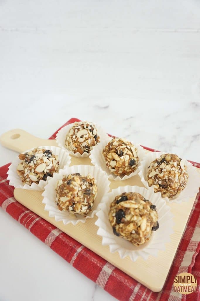 6 no bake blueberry muffin oatmeal balls in paper liners