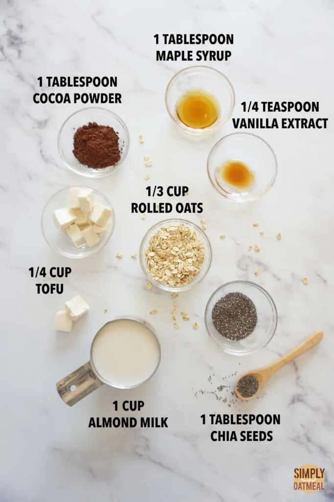 Ingredients to make a vegan chocolate mousse oatmeal smoothie