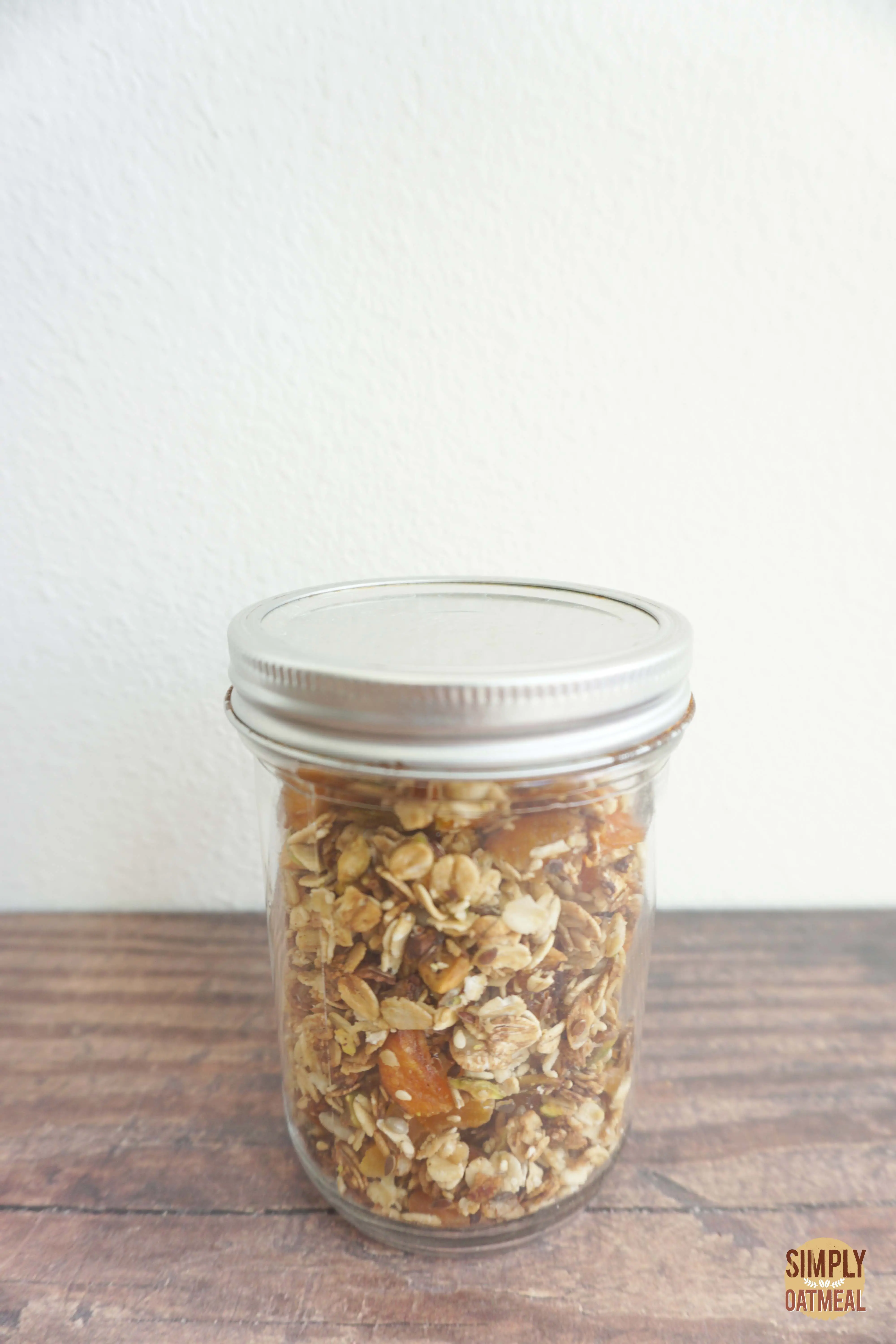 Apricot pistachio granola in an airtight mason jar