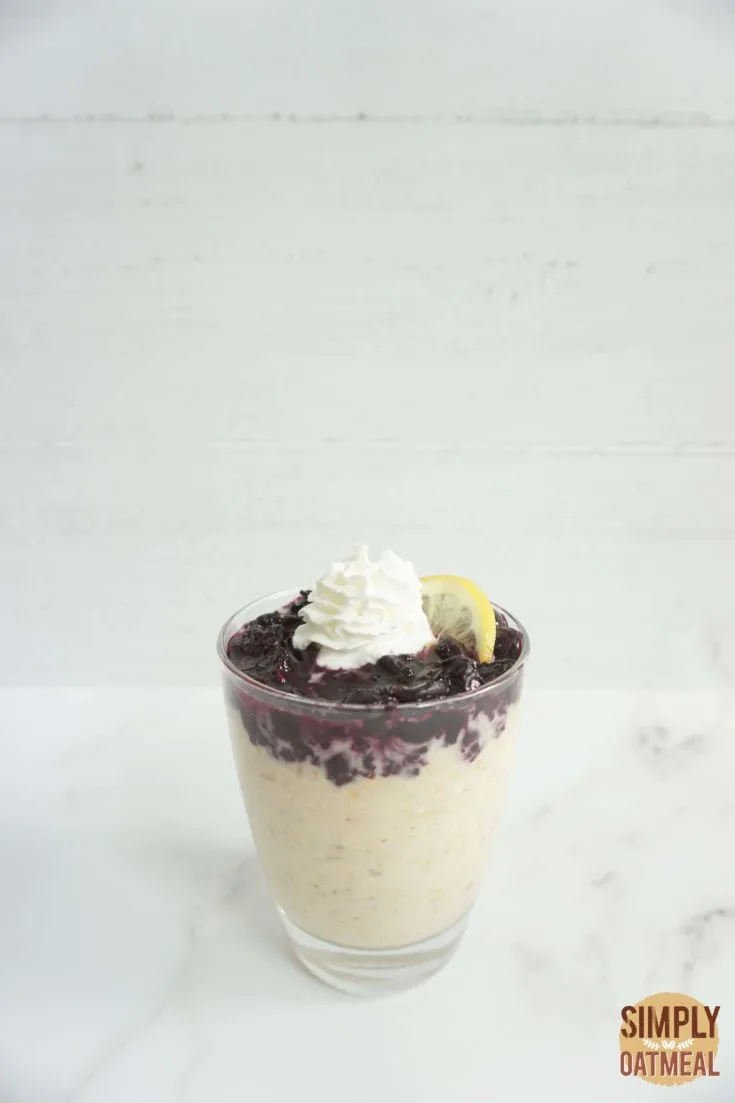 Single serving of blueberry lemonade overnight oats in a glass cup