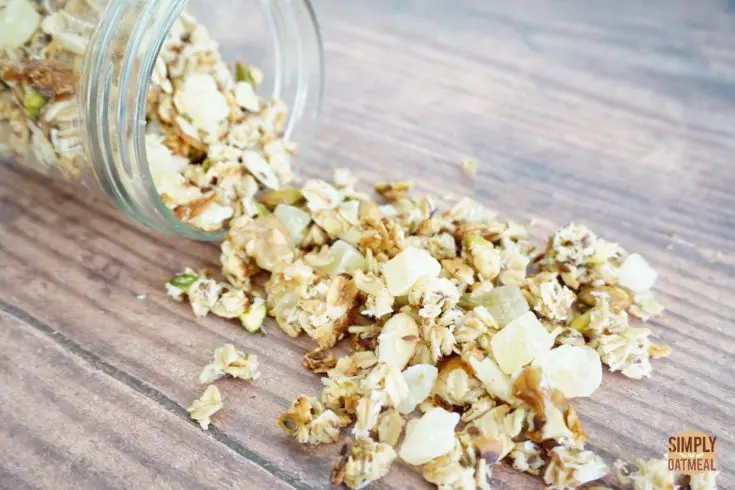 Closeup of coconut lime pineapple granola poured onto a plate