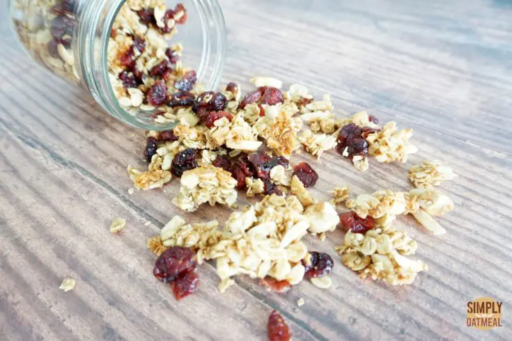 Closeup of cranberry almond granola poured onto a plate