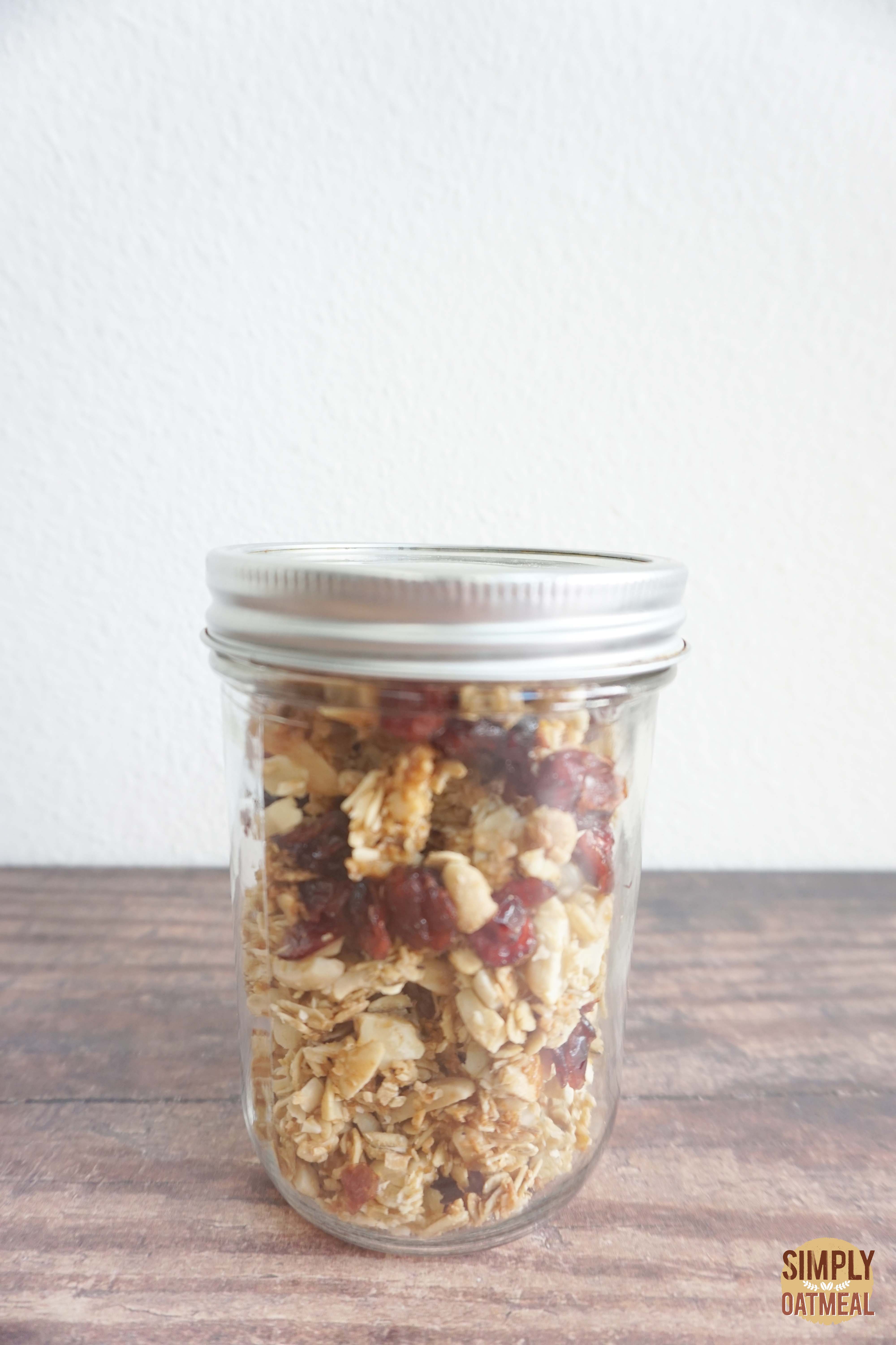 Cranberry almond granola in an airtight mason jar
