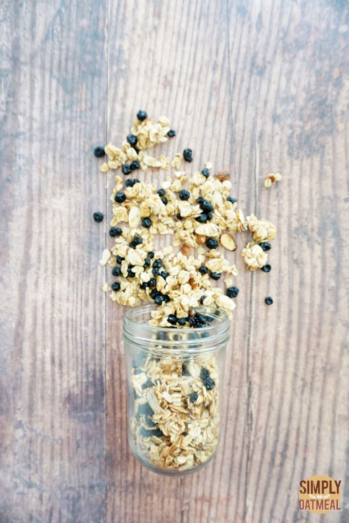 Lemon blueberry granola combines dried blueberries, lemon, almonds and maple syrup with rolled oats.