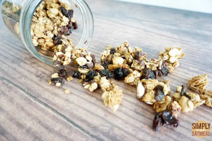 Closeup of oatmeal raisin cookie granola poured onto a plate