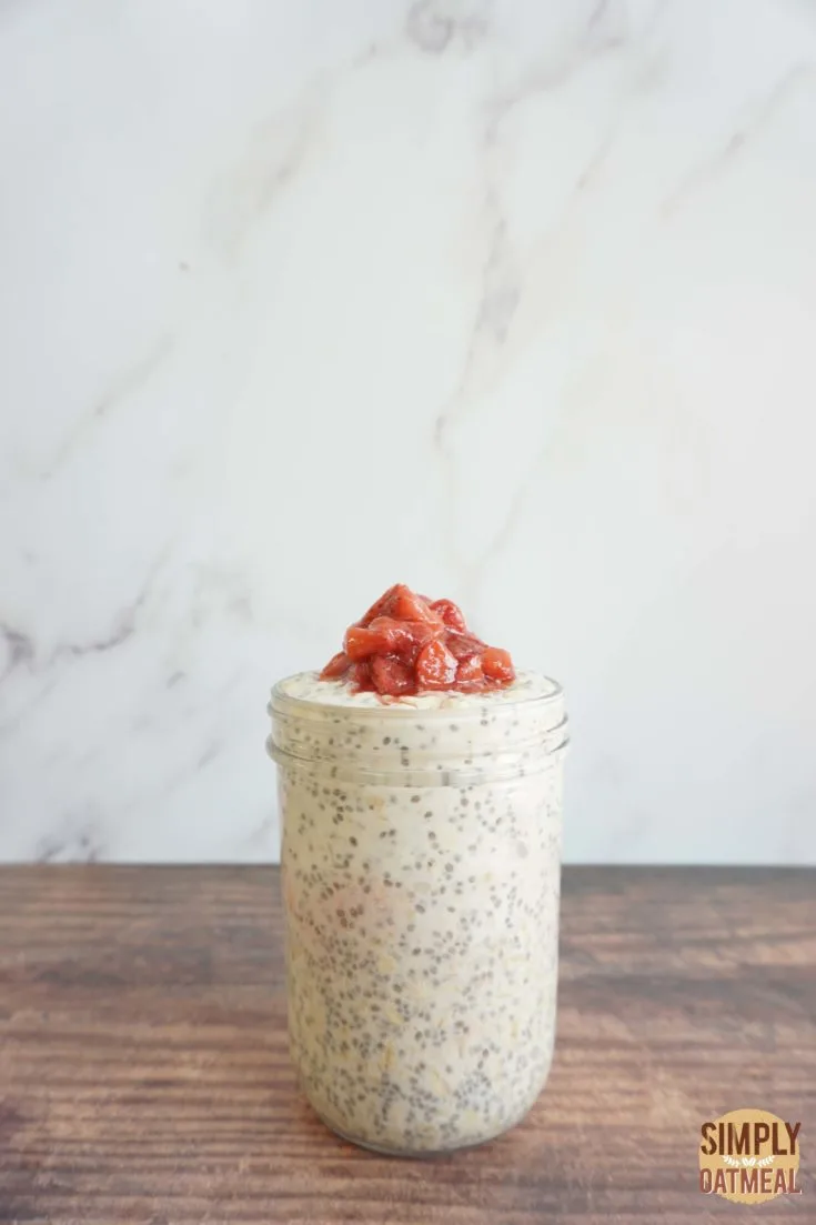 Single serving of strawberry rhubarb overnight oats in a mason jar