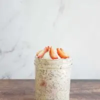 Single serving of strawberry vanilla overnight oats in a mason jar