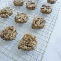 Hot espresso chocolate chip oatmeal cookies on a wire rack