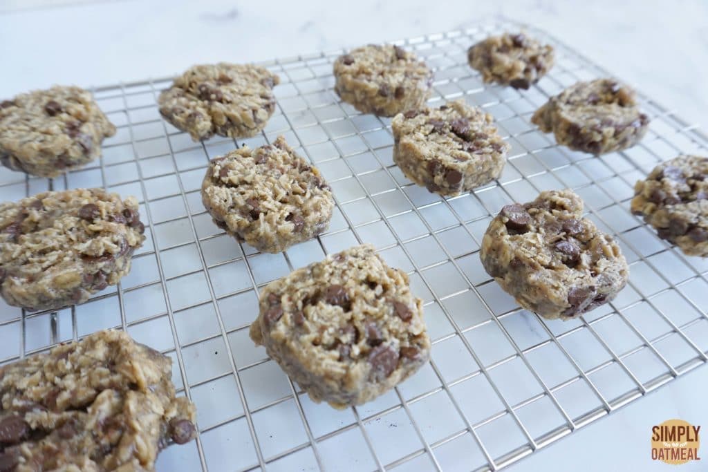 Fresh baked espresso chocolate chip oatmeal cookies cooling on a wire rack