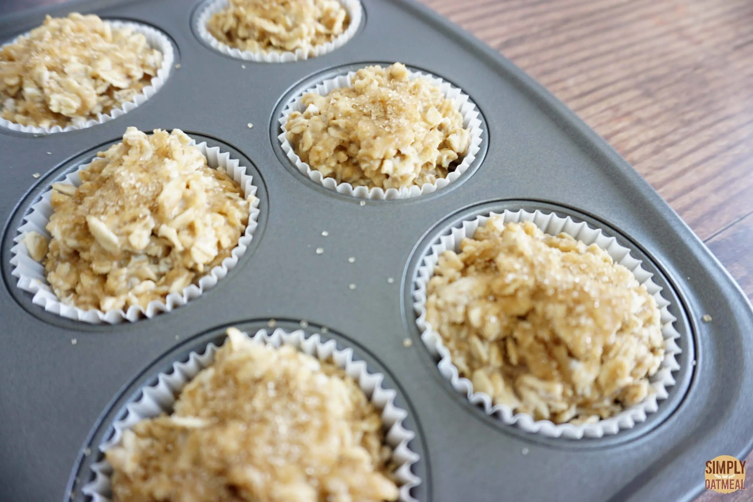 Baked maple brown sugar oatmeal muffins in a muffin pan