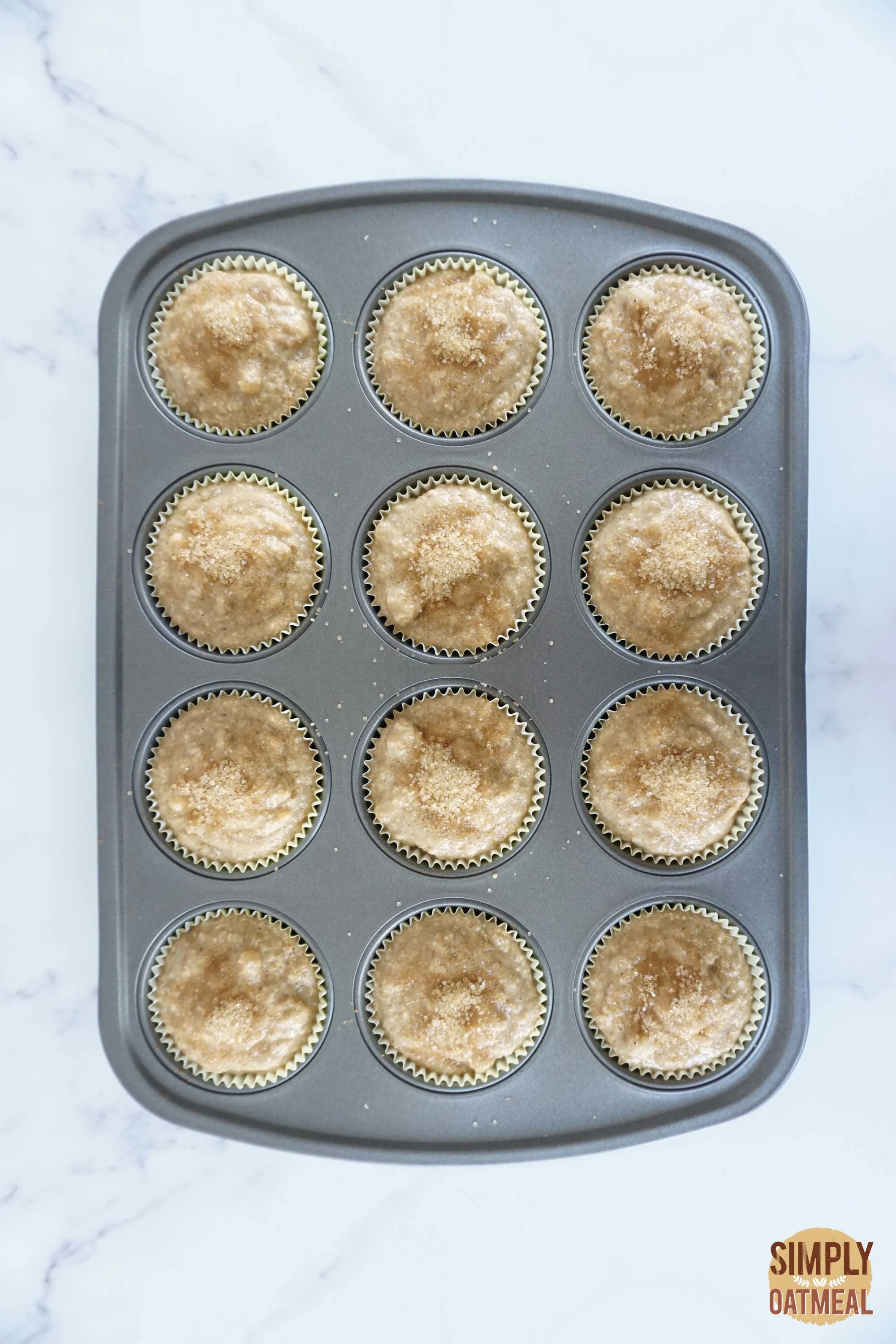Vegan banana oatmeal muffins batter in muffin pan