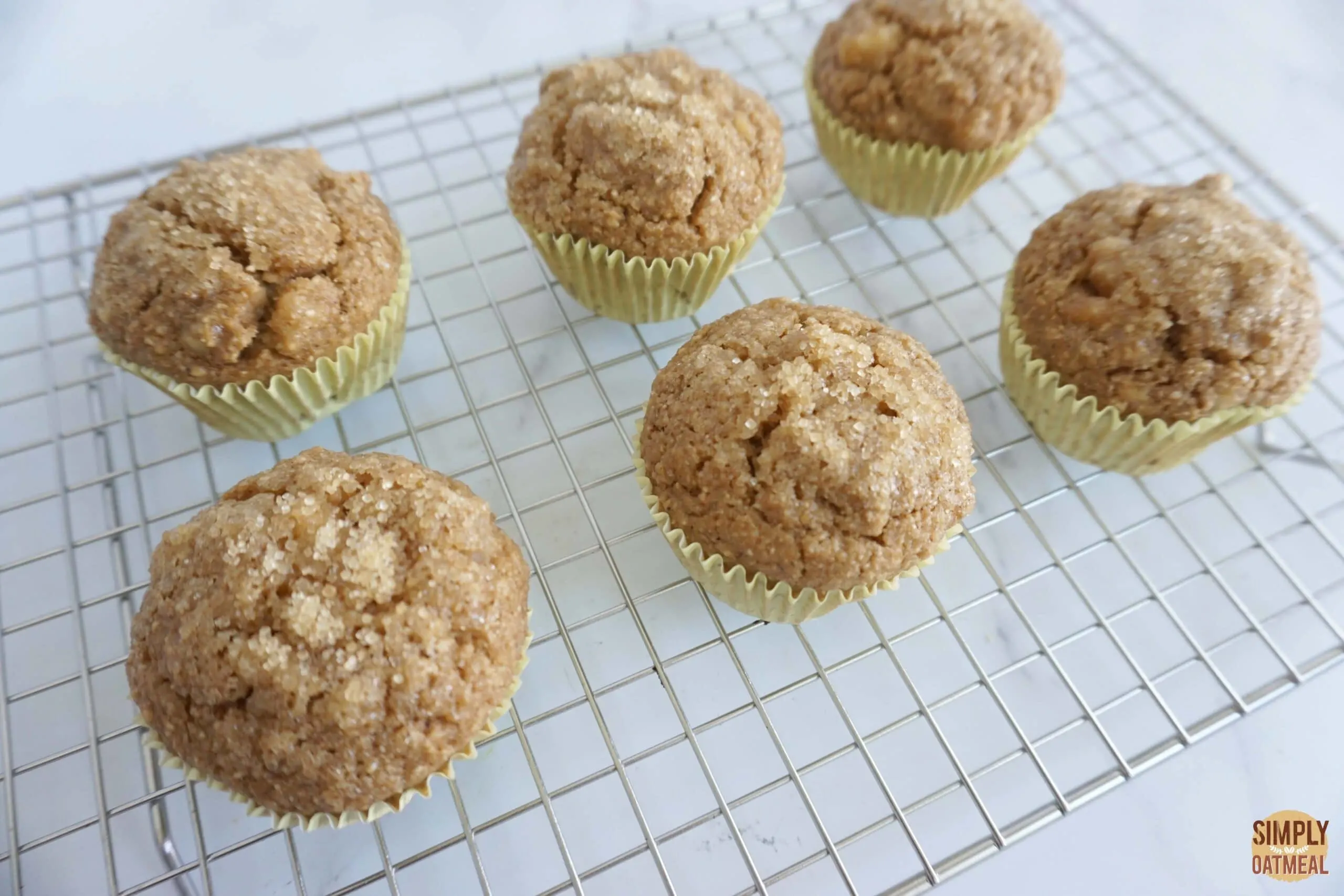 Vegan banana oatmeal muffins cooling on wire rack