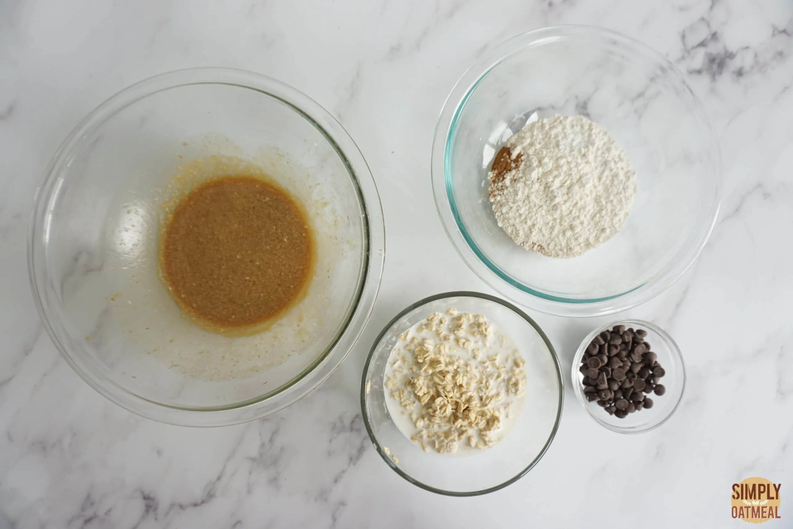 Wet and dry ingredients to make chocolate chip oatmeal muffins