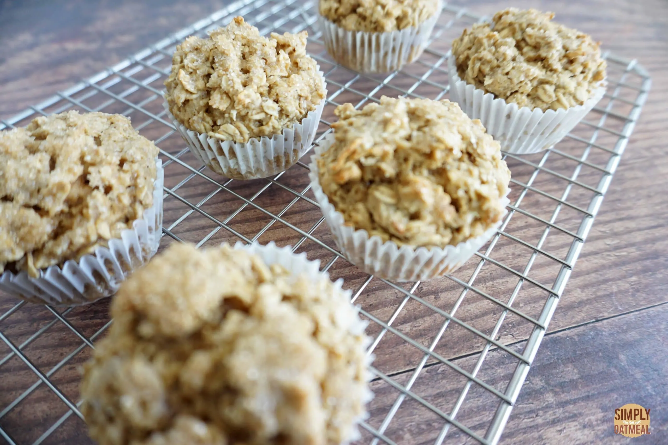 Maple brown sugar oatmeal muffins cooling on a wire rack